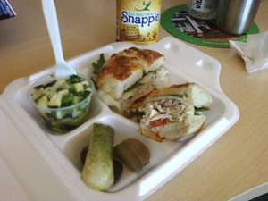Turkey Pastrami Bagel Sandwich with Cucumber Salad at Greenfield's Bagels