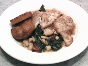 Skate Wing, Sautéed Dandelion Greens with White Bean and Fried Polenta Cakes